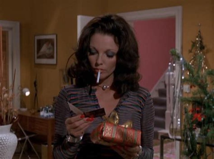 Does Joan Collins smoke?