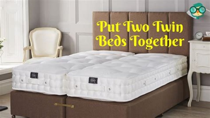 How do you keep two twin beds together?